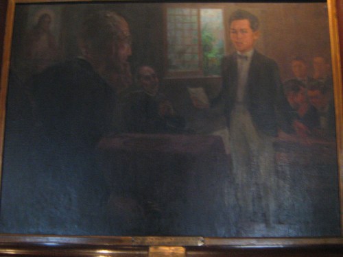Si Rizal sa eskwelahan.  Mula sa Dambanang Rizal.