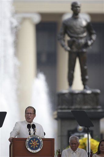 President Benigno Simeon Aquino, III hails Andres Bonifacio and uses the Guilermo Tolentin-made  monument at the Liwasang Bonifacio as the illustration of the Filipino, calm but determined in the face of threats against our sovereignty in his 115th Independence Day speech, 12 June 2013 (AP Photo/Aaron Favila).