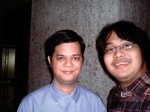 Xiao Chua with Undersecretary Manuel"Manolo" Quezon, III, 2005.  From the Archives of the Xiao Chua Library.